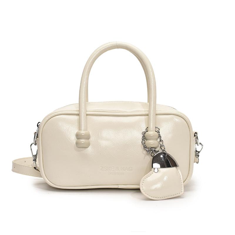 Korean Version of Fashionable Simple Retro Solid Color Portable Boston Bag Casual Versatile Solid Color Commuting Foreign Style Messenger Women's Bag