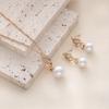 Simple faux pearl pendant necklace and earrings inlaid with rhinestones, creative spiral-shaped bridal accessories to match wedding dresses, suitable