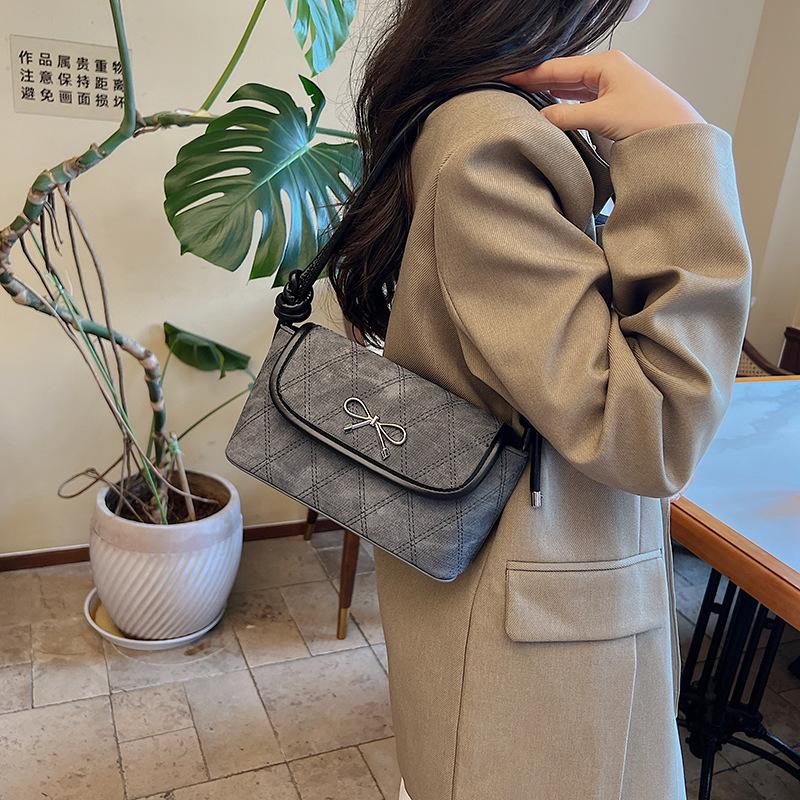 Simple and fashionable bow underarm bag 2025 new niche high-end commuter shoulder oblique span bag