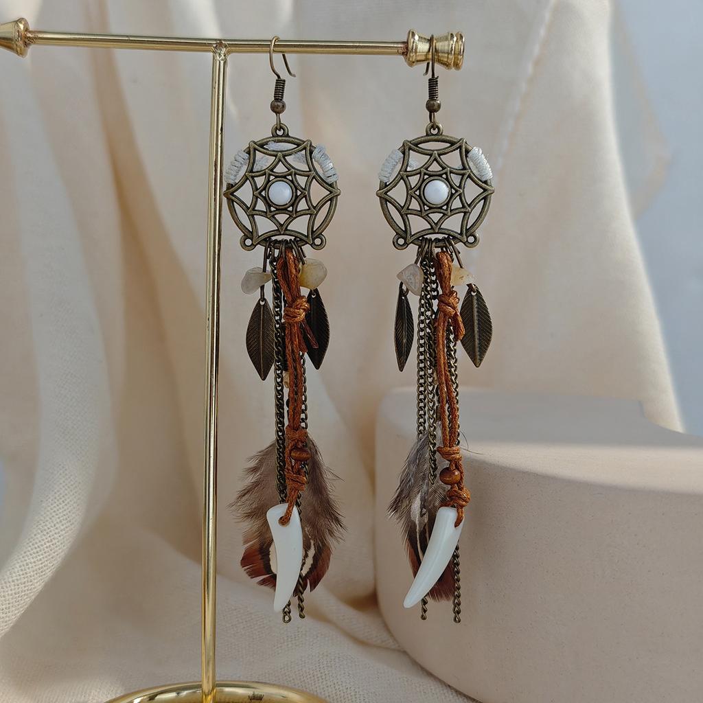 Retro ethnic style woven feathers long fringed earrings, bohemian high-end hollow rice bead earrings