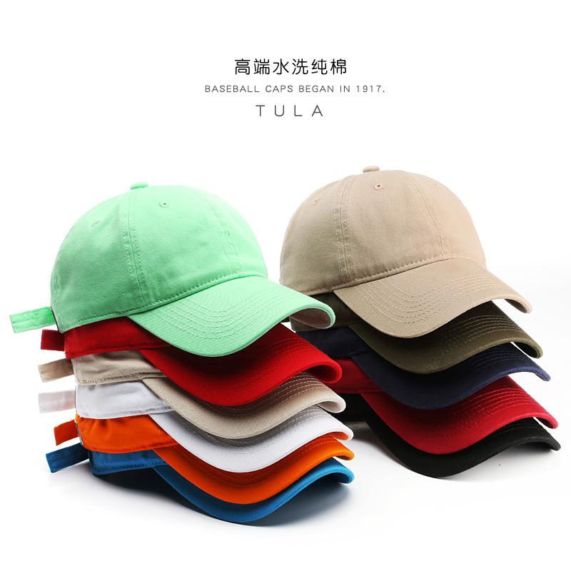 Washed cotton baseball cap with curved brim, solid color, for men and women, offering sun protection and shade
