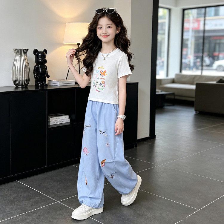 Sommer-Cartoon-T-Shirt & Weitbeinige Hosen Set für Mädchen - Stylisches Lässiges Zweiteiler für Mittlere & Große Kinder, Kollektion 2026.