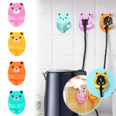 Gancho de armazenamento de parede Suporte de plugue de urso Suporte de tomada de energia sem perfuração Gancho furtivo de cozinha Cabide autoadesivo de parede Banheiro