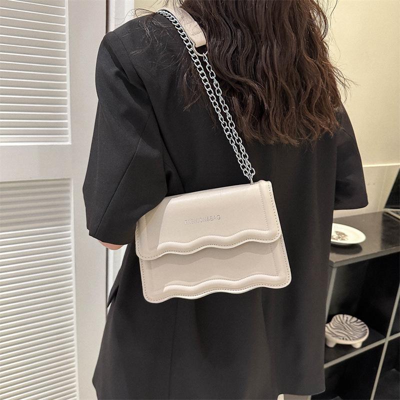 Korean Style Small Square Women's Crossbody Bag - 2025 Solid Color, Wave Pattern, Chain Shoulder, Simple Fashion.