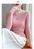 Round Neck Loose Fit Sweater with Seamless Knitting Technology - Comfortable and Slimming Design.