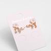 Korean Needle Earrings, White Flower Rear-Hanging Stud Earrings, High-End Alloy Jewelry.