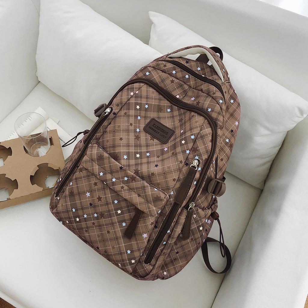Schoolbag Korean plaid star backpack for female middle and high school students, large-capacity schoolbag, light and dirt-resistant versatile backpack