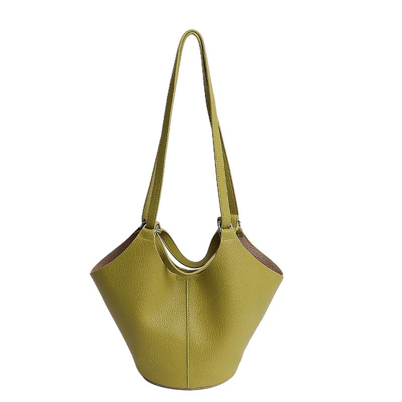 Niche high-end soft leather vegetable basket hand carrying bucket bag women's new commuter shoulder armpit bag