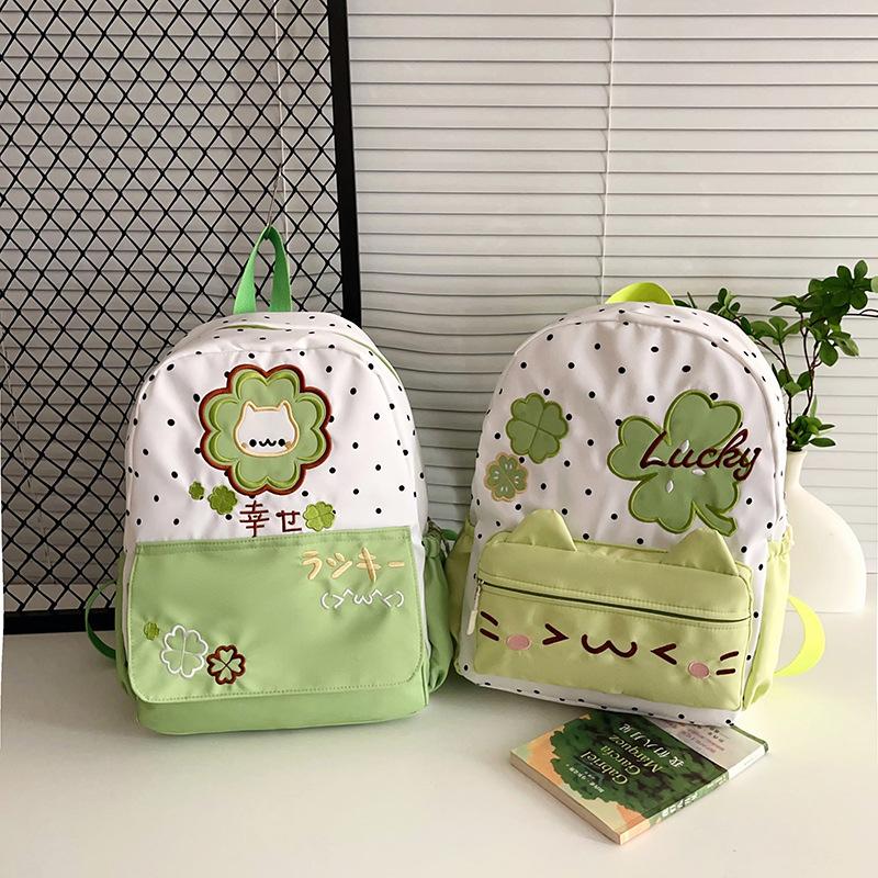 Schoolbag trendy high-value polka dot four-leaf clover cartoon backpack for junior and high school students cute kitten large-capacity schoolbag