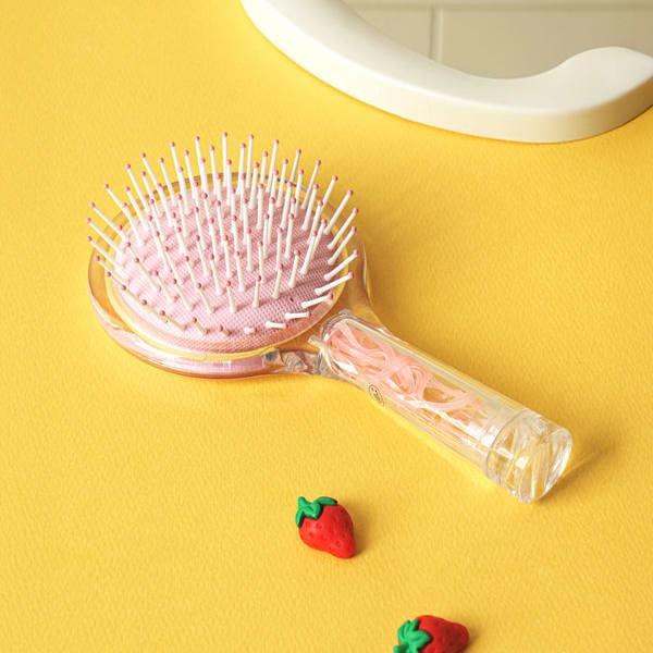 Hairbrush With Built-In Hair Tie