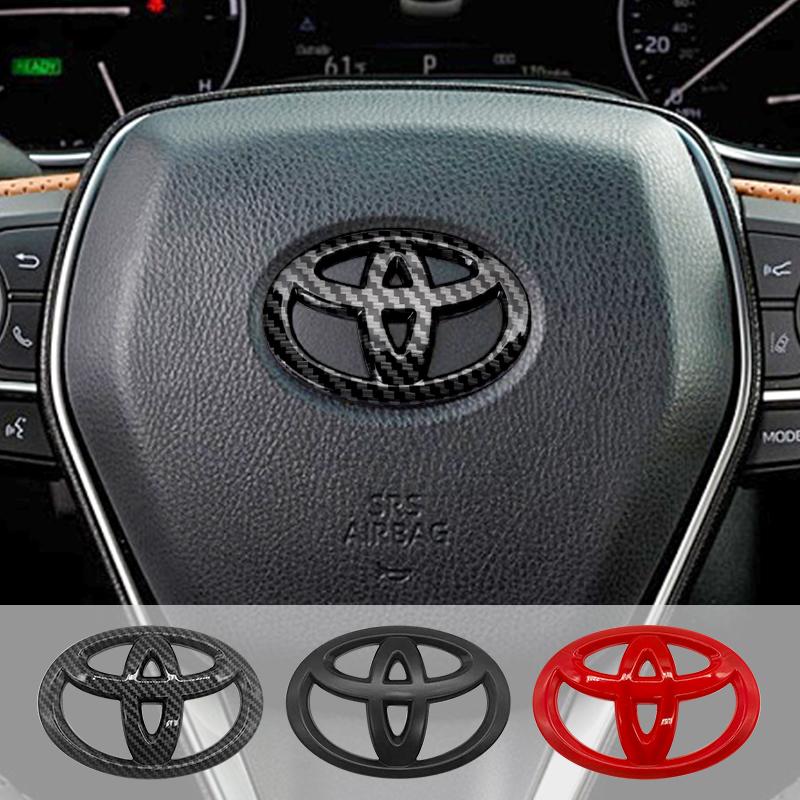 65X47MM Car Steering Wheel Center Emblem Logo Sticker For Toyota Corolla Yaris Aygo Prius RAV4 Crown CHR Camry Auris Verso