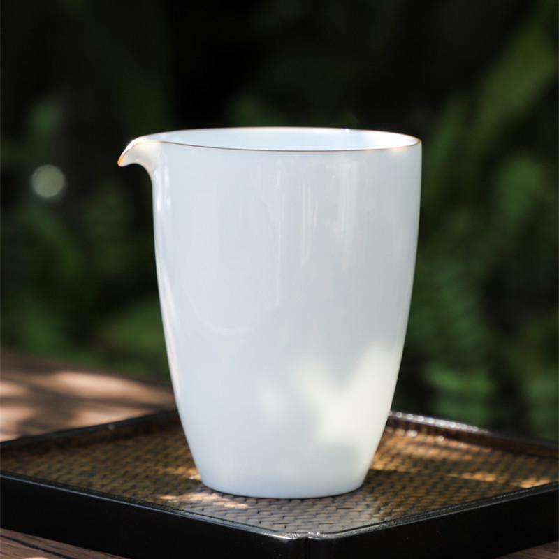Elegant Thin White Porcelain Tea Pitcher with Sweet Glaze - Ceramic Tea Divider and Serving Cup.