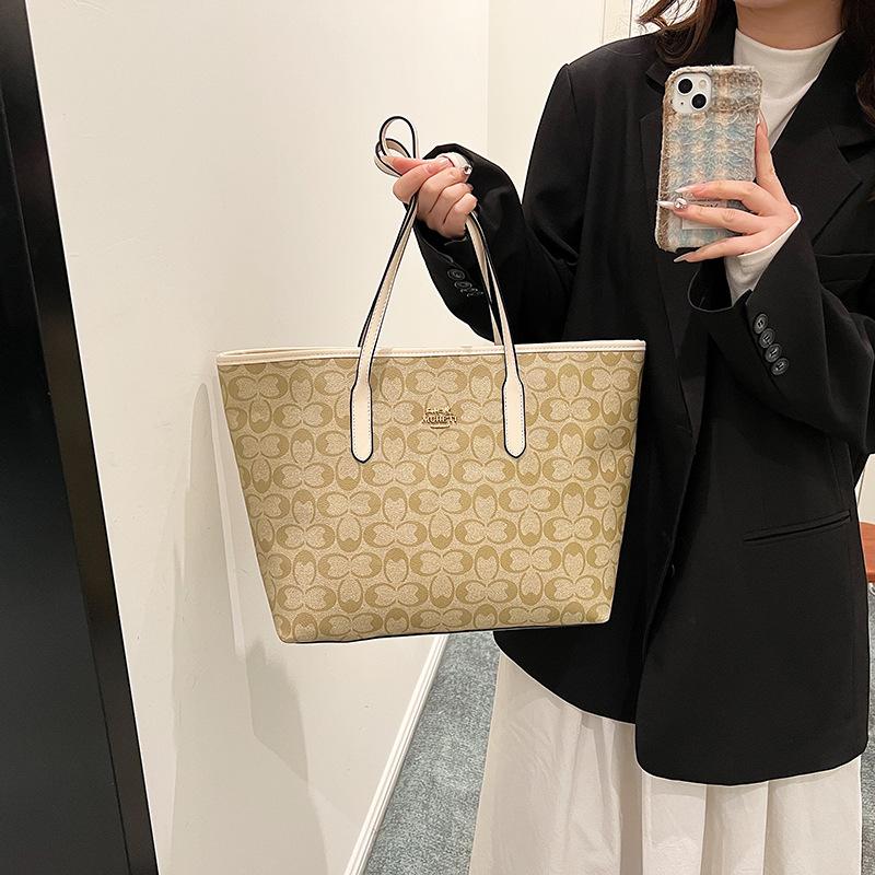 Bolso de gran capacidad para mujer 2026 nuevo bolso de hombro de moda sensación casual bolso tote para el trabajo y el transporte diario