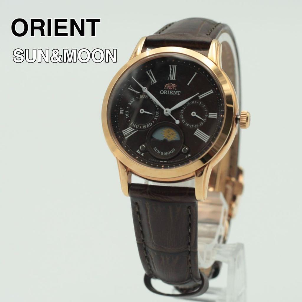 Used ORIENT Watch SUN&MOON Day Date Quartz Gold Brown