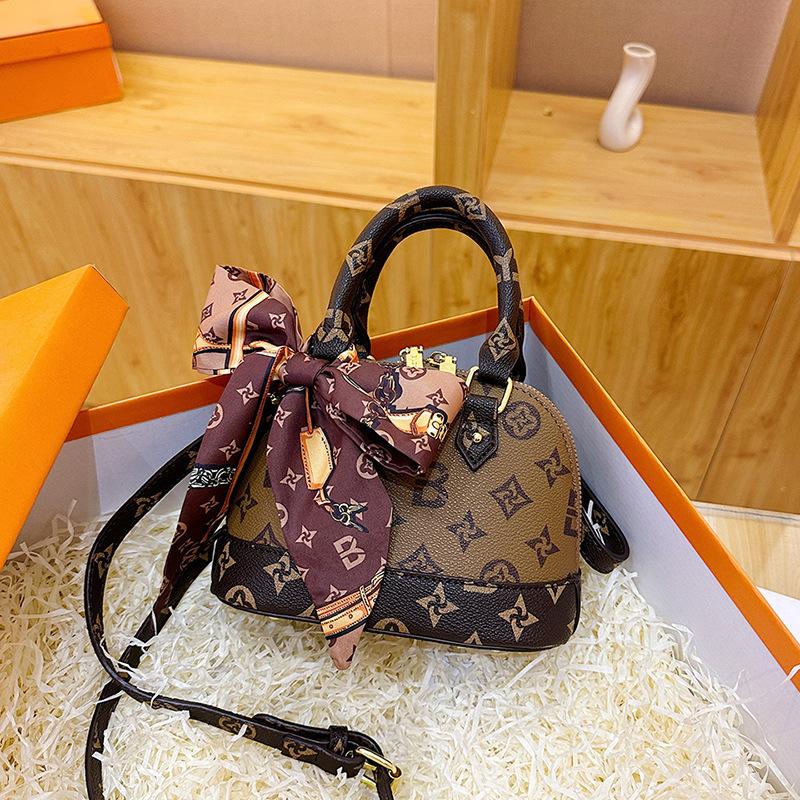 

Легкая роскошная сумка-ракушка женская, новый иностранный стиль, универсальная сумка для поездок на работу, универсальный шелковый шарф-бантик, новый