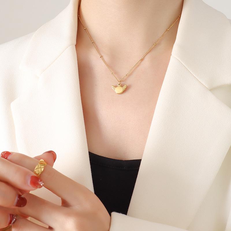 Gold-Plated Geometric Wing Pendant Necklace: Japanese-Korean Design with Titanium Steel Clavicle Chain