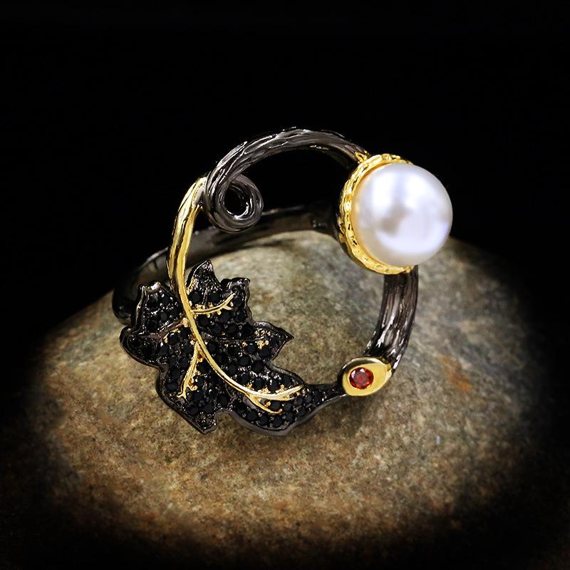 

Подвеска в пасторальном стиле Tamsui Zhen с растительным жемчугом, длинное драпированное двухцветное кольцо из черного золота для женщин No. 10