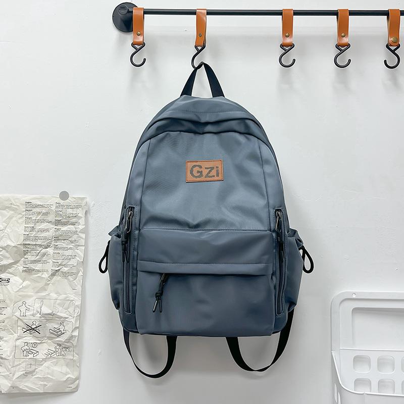 

School bag Girls college students High school backpack Large capacity versatile leisure bag Fashion trend men s backpack