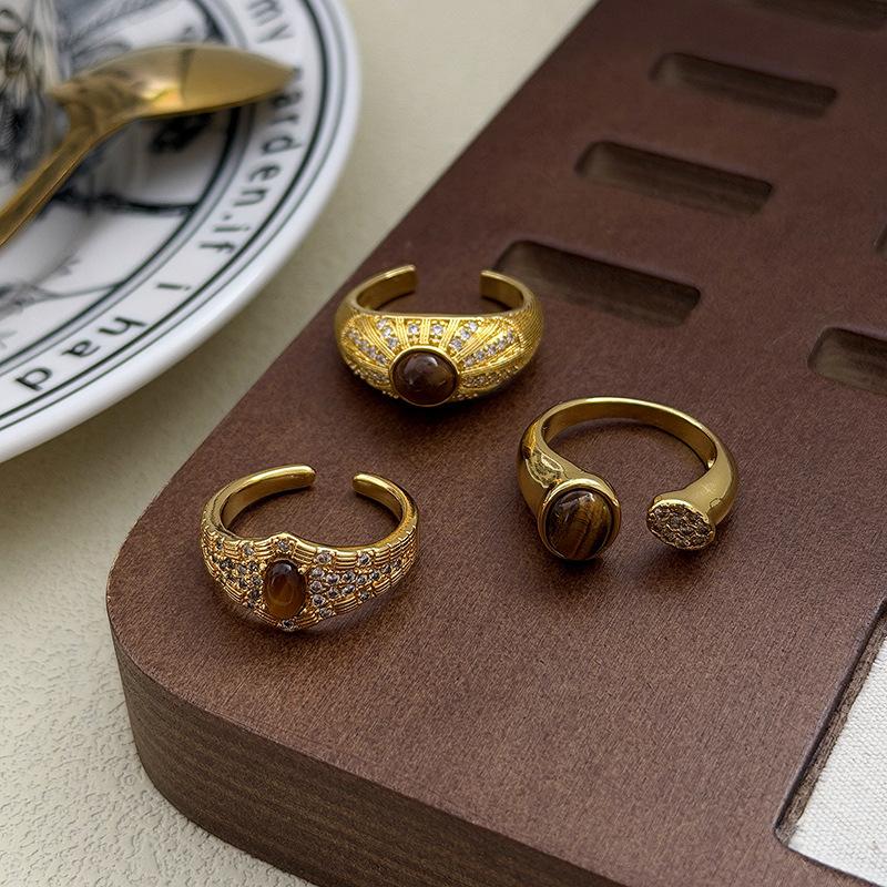 Hochwertiger leichter Luxus Retro Hof Nischen Design Leichter Luxus Imitation Tigerauge Stein Offener Ring Geometrischer Stapelring Frau