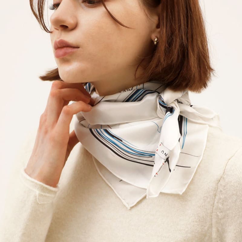 Woman wearing ONSZ hat and silk scarf