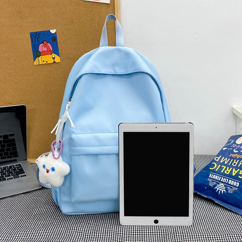 Small fresh girl backpack Japanese solid color schoolbag female Korean version ins versatile large capacity student backpack new