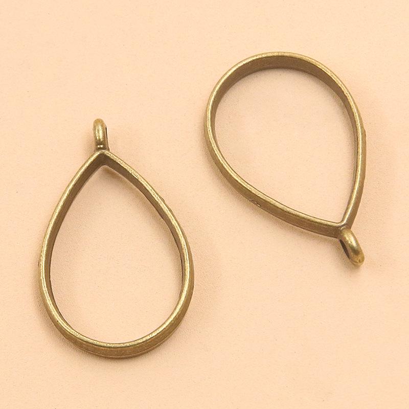 17 Ancient Green DIY Alloy Jewelry Pendants: Moon, Round, Heart with Drip Glue and Hollow Borders.