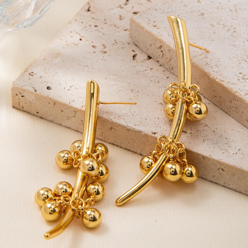 Light luxury high-end beaded fringed earrings 18K gold high color retention ins original design heavy industry fashion earrings