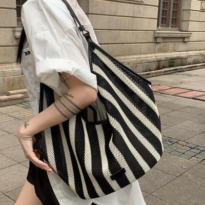 Niche Korean Version of Large-capacity Woven Bag Tote Bag Summer New Hollow Lazy Wind Shoulder Armpit Bag Beach Bag