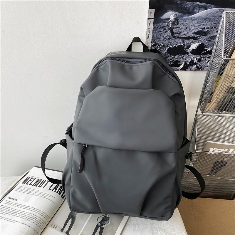

Men s Large Waterproof Nylon Backpack: Korean Style, Pleated Design, Perfect for College, Travel, and Laptop Use.