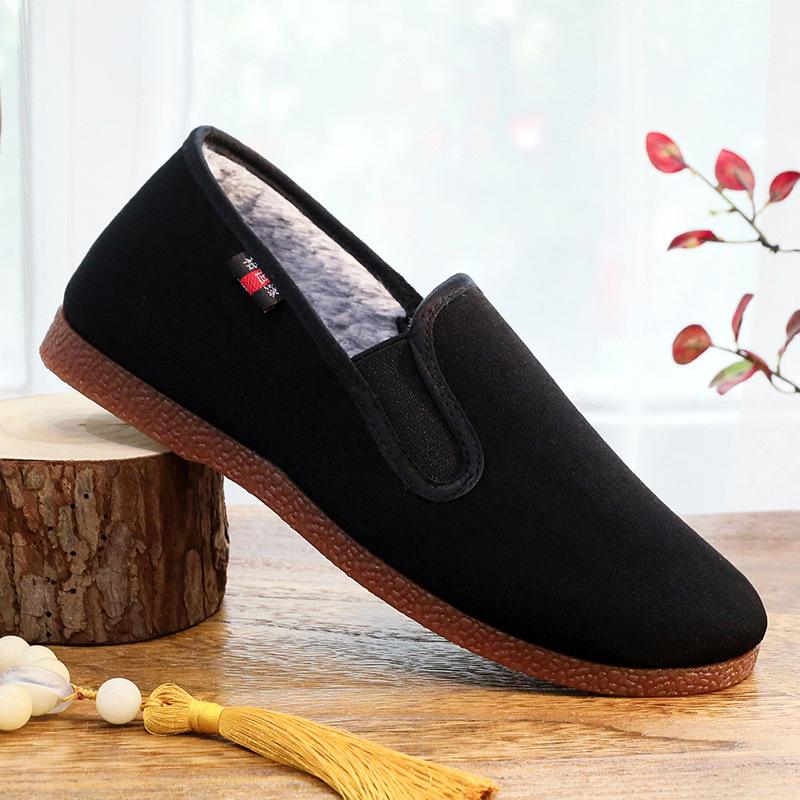 

Мужские теплые тканевые туфли на плюшевой подкладке черного цвета с искусственным кроличьим мехом, нескользящая подошва из говяжьей жилы. 39 чёрный