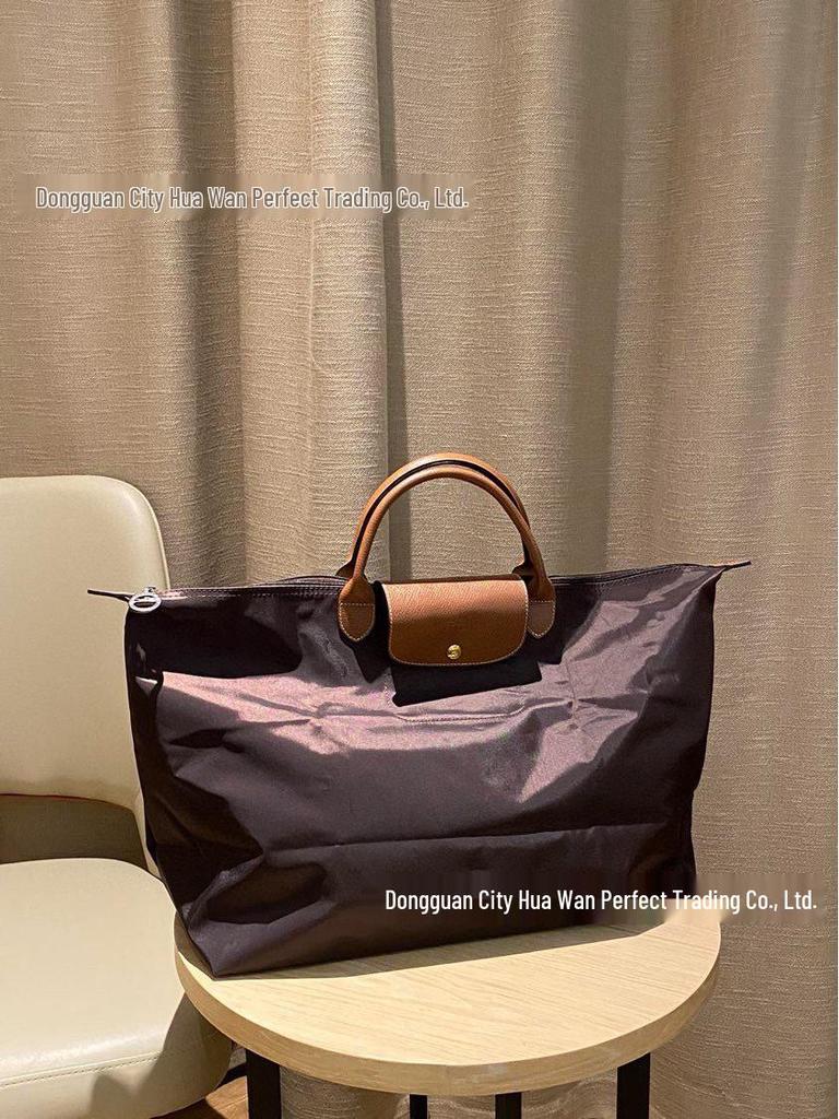 Xiangjia Large-Capacity Waterproof Oxford Travel Tote Bag, Lightweight and Foldable.