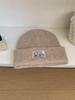 Solid color knitted wool hat women's autumn and winter face small retro sticker bag head warm cold ear protection cold hat