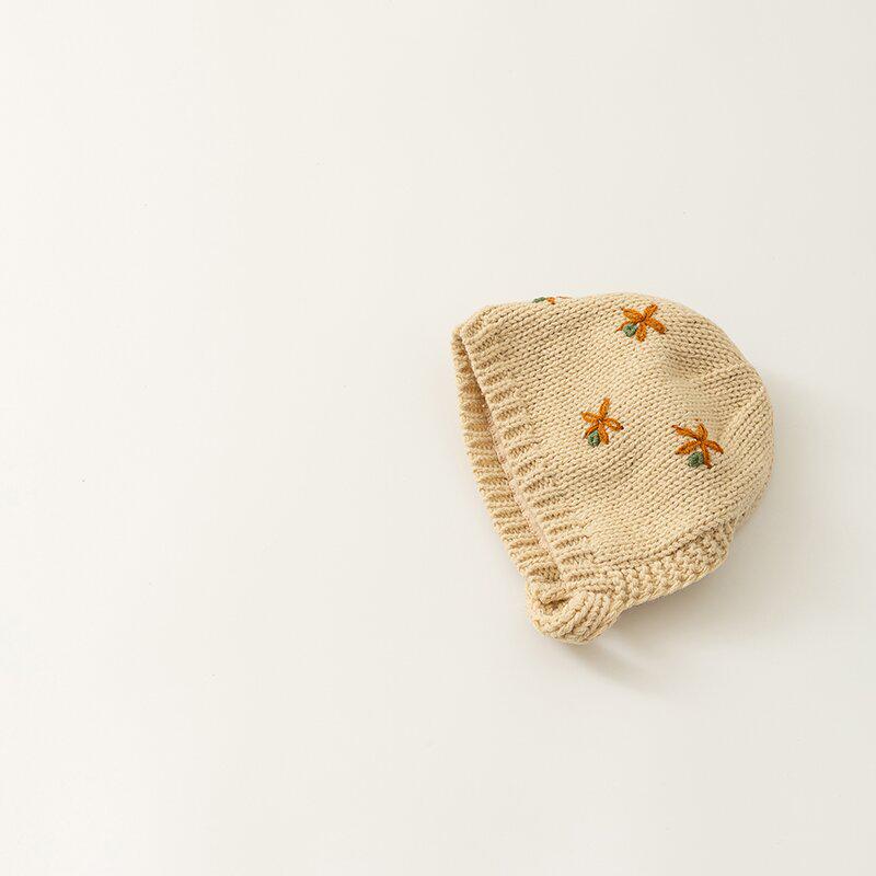 Korean-Style Hand-Knitted Wool Hat for Newborns – Warm, Windproof, and Ear-Protective for Boys and Girls.