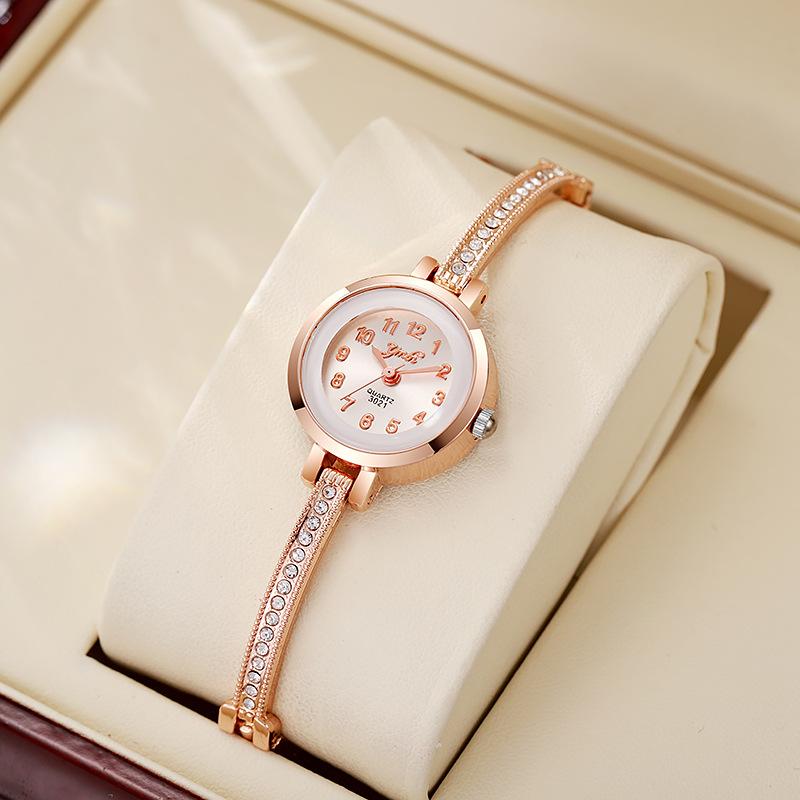 Women's high appearance level vivid exquisite Arabic numerals dial small dial steel band quartz watch.