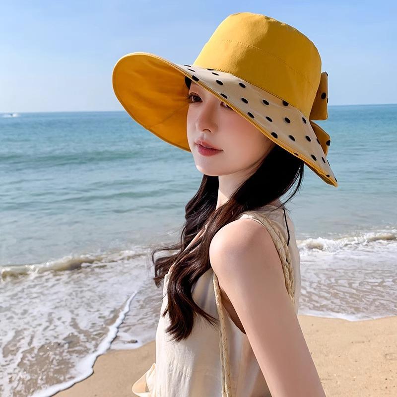 Women's Spring and Summer Elegant and Versatile Large Brimmed Sun Hat Korean Version Polka Dot Bow Fisherman Hat Foldable Outing Basin Hat