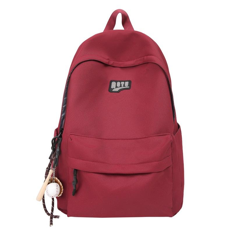 Student schoolbag Korean version, junior high school backpack, students go to school, large capacity, high value, solid color schoolbag, new model