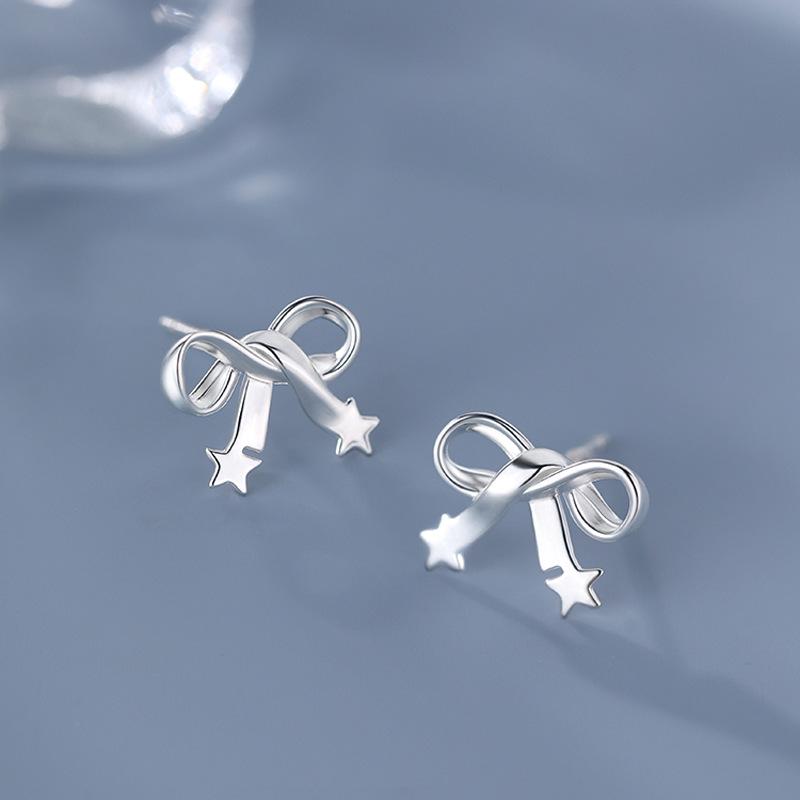 Niche Design Star Bow Earrings: Elegant & Trendy Studs for Women 2025.