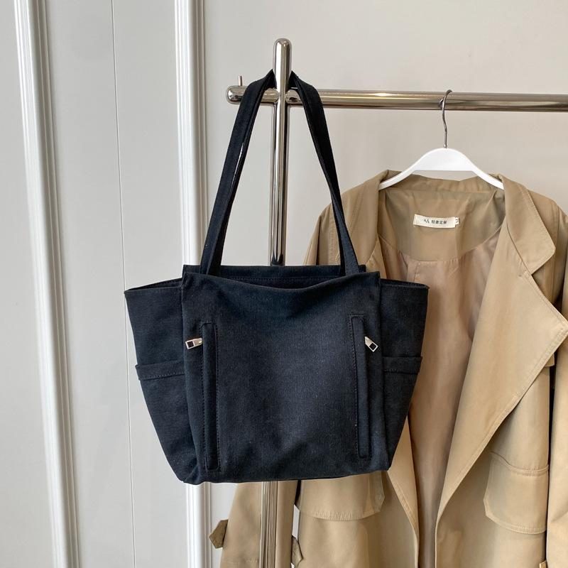 New large-capacity versatile handbag 2025 spring and summer popular lightweight shoulder bag simple tote hand carry big bag women