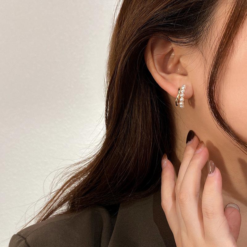 Korean Style Pearl Hoop Earrings: Silver Needle Studs for Women - Luxurious Autumn/Winter Bridal Jewelry with High-End Appeal.