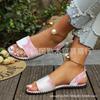 European and American one-word buckle flat sandals women's new open-toed simple pearl metal buckle cool slippers