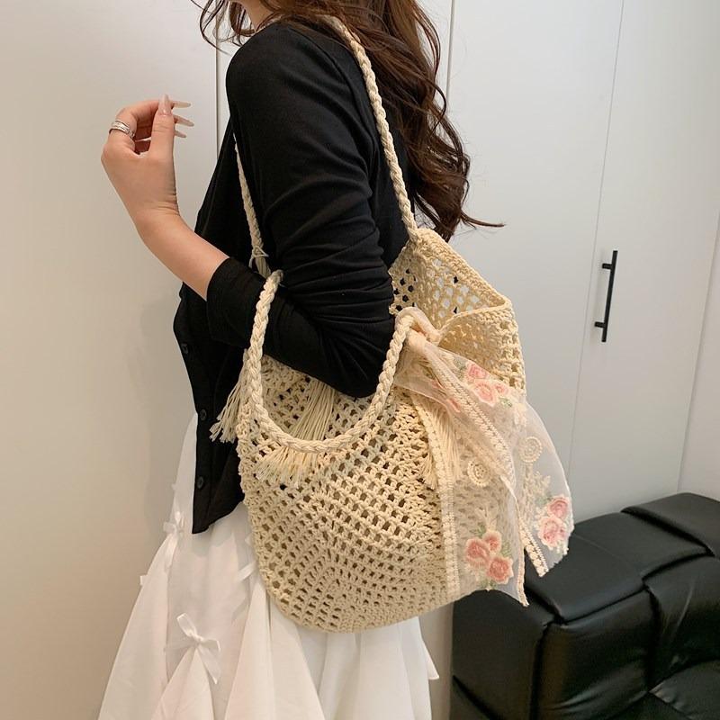 Casual large-capacity woven bag New hollow lazy wind shoulder bag Casual beach bag Women's bag