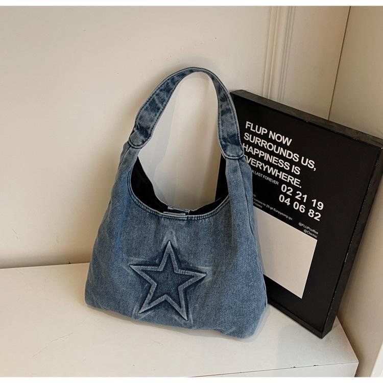 

Large capacity fashionable retro texture shoulder bag women s 2025 new denim casual commuter underarm tote bag синій