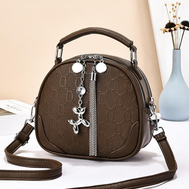 Simple and fashionable single shoulder portable messenger bag autumn and winter exquisite small round bag women's multi-layer fringed bag
