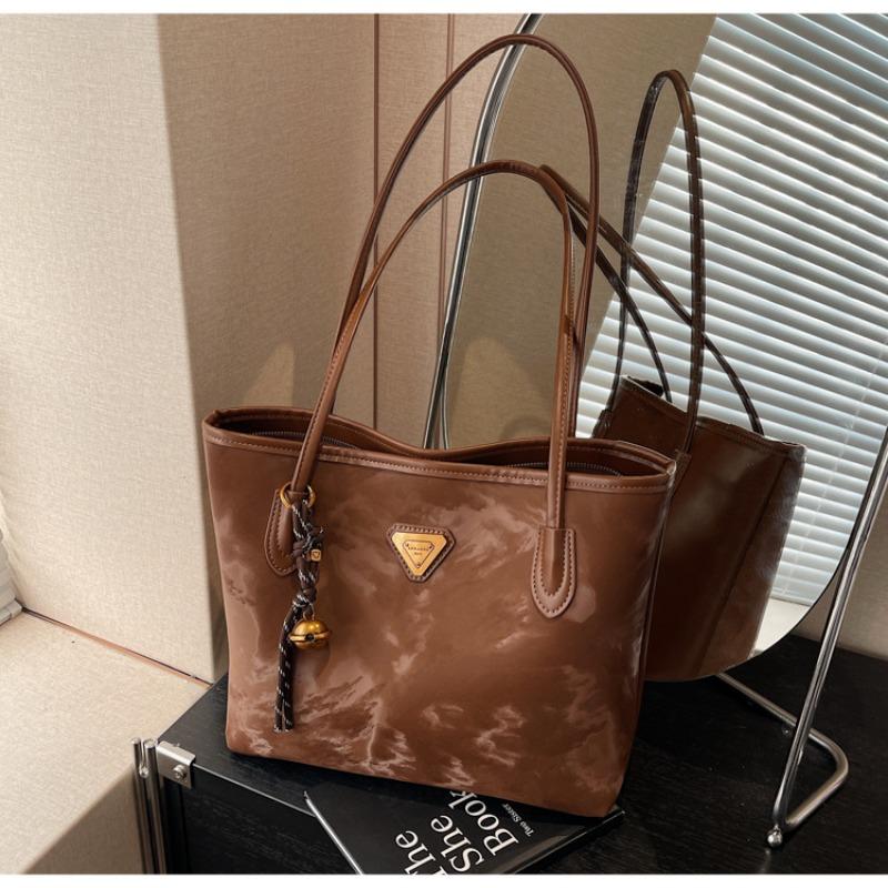 

Today s popular niche fashionable style pattern underarm tote bag female student commuting versatile simple shoulder bag коричневый