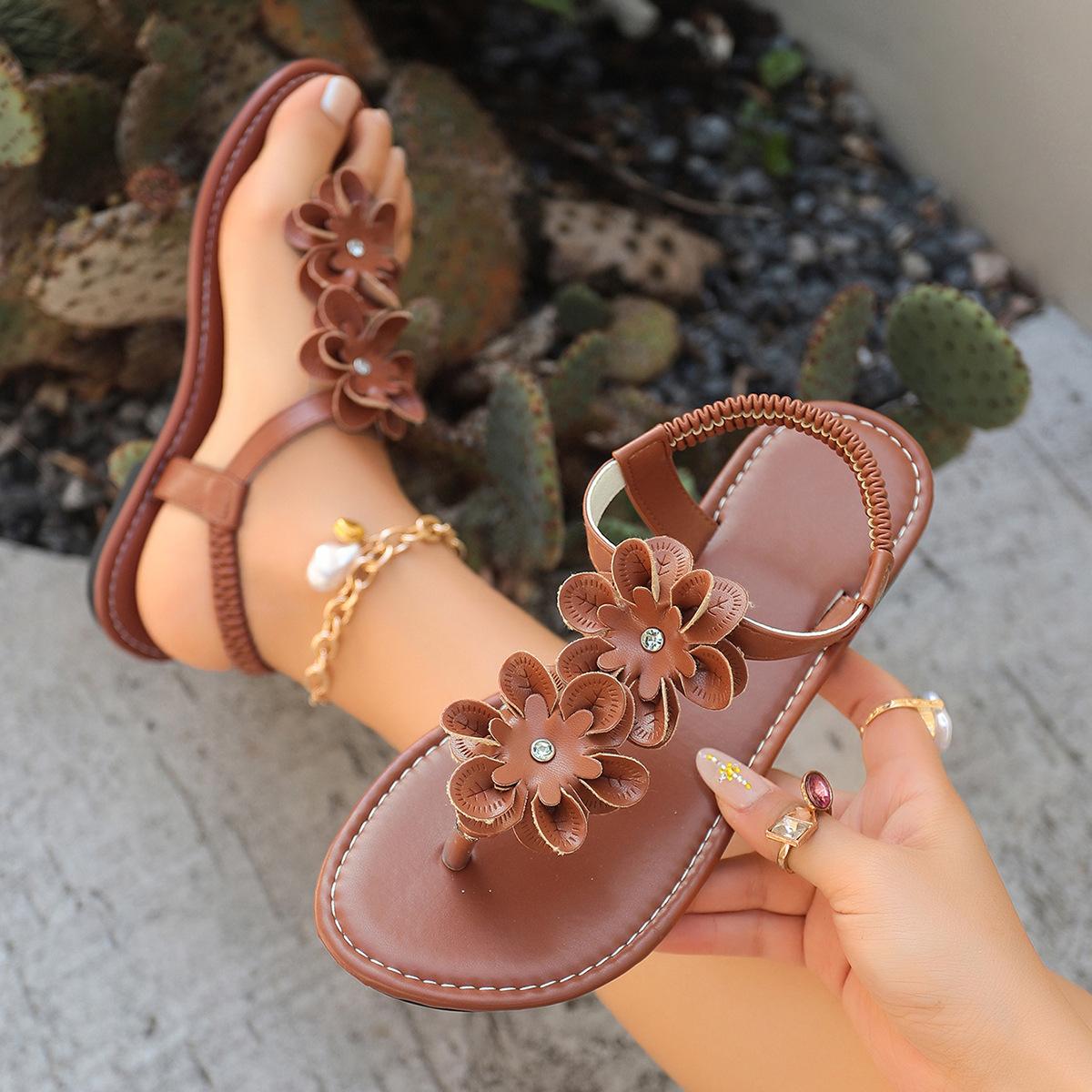 

European and American elegant flower toe flat sandals vacation style elastic band large size beach cool slippers 43 коричневий