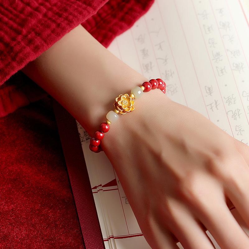 Tiqia's echtes Foto eines Damen-Lotus-Zinnoberarmbands in Lila-Gold-Sand/Kaiser-Sand-Tierkreiszeichen-Armband - Nationaler Trend