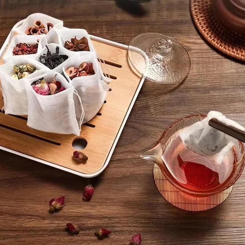 100Pcs Disposable Teabags Non-Woven Fabric Tea Filter Bag for Spice Tea Infuser with Draw String Filter Paper for Herb Loose Tea
