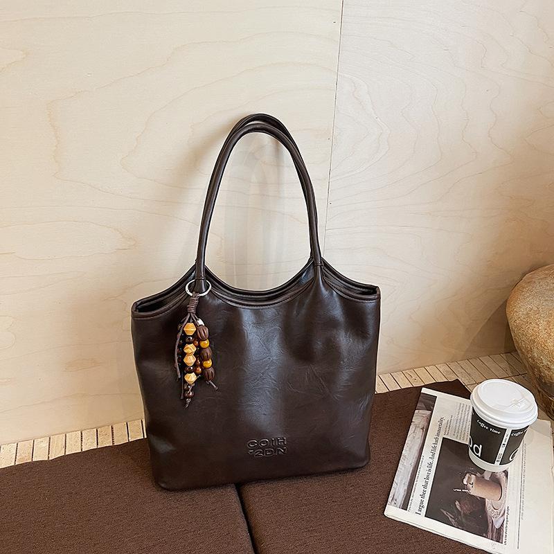 

Large capacity underarm bag women s 2025 new leisure commuter women s shoulder bag going out to work tote bag single bag