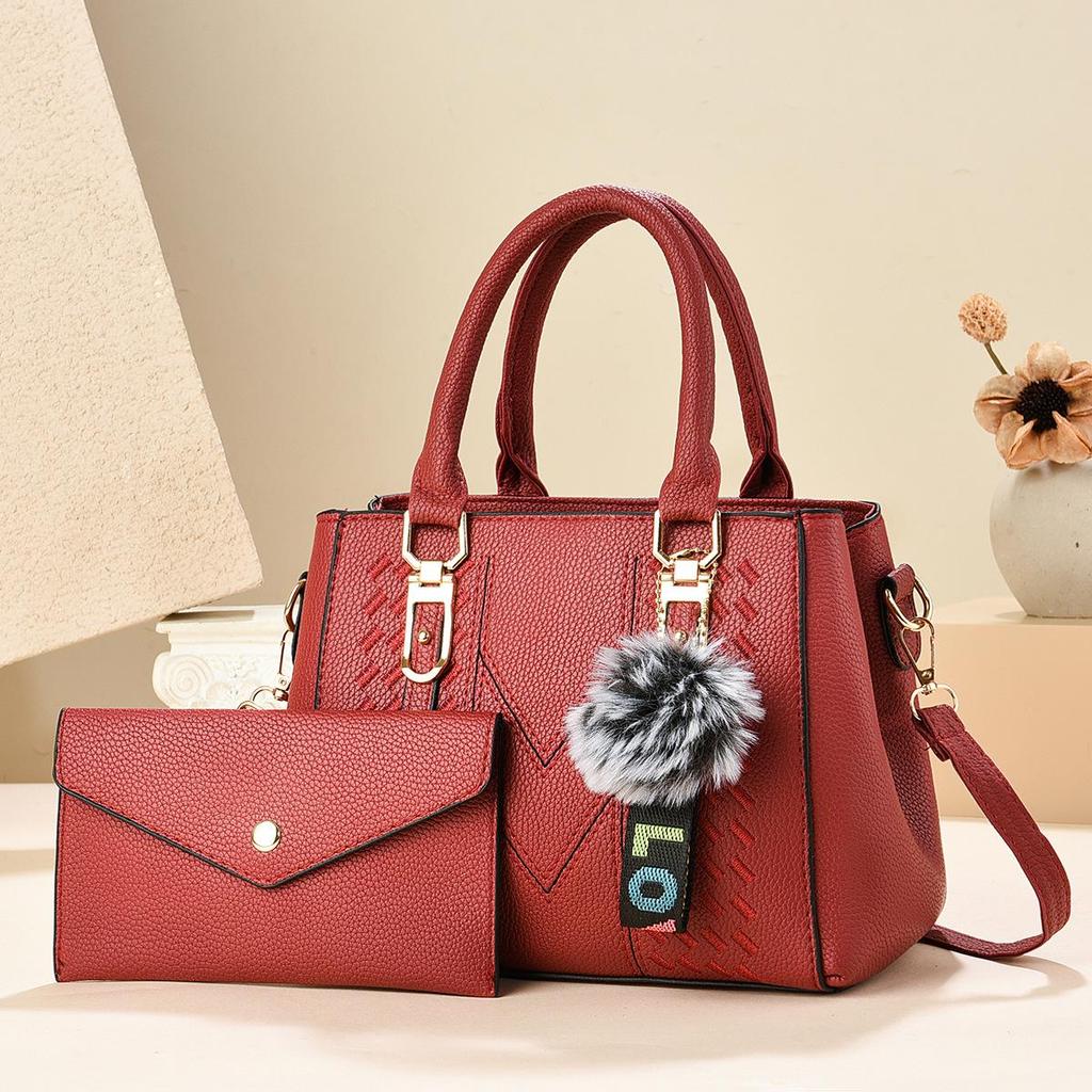 2024 New Korean Style Fashion Embroidered Women's Handbag with Large Capacity and Pom-Pom Pendant