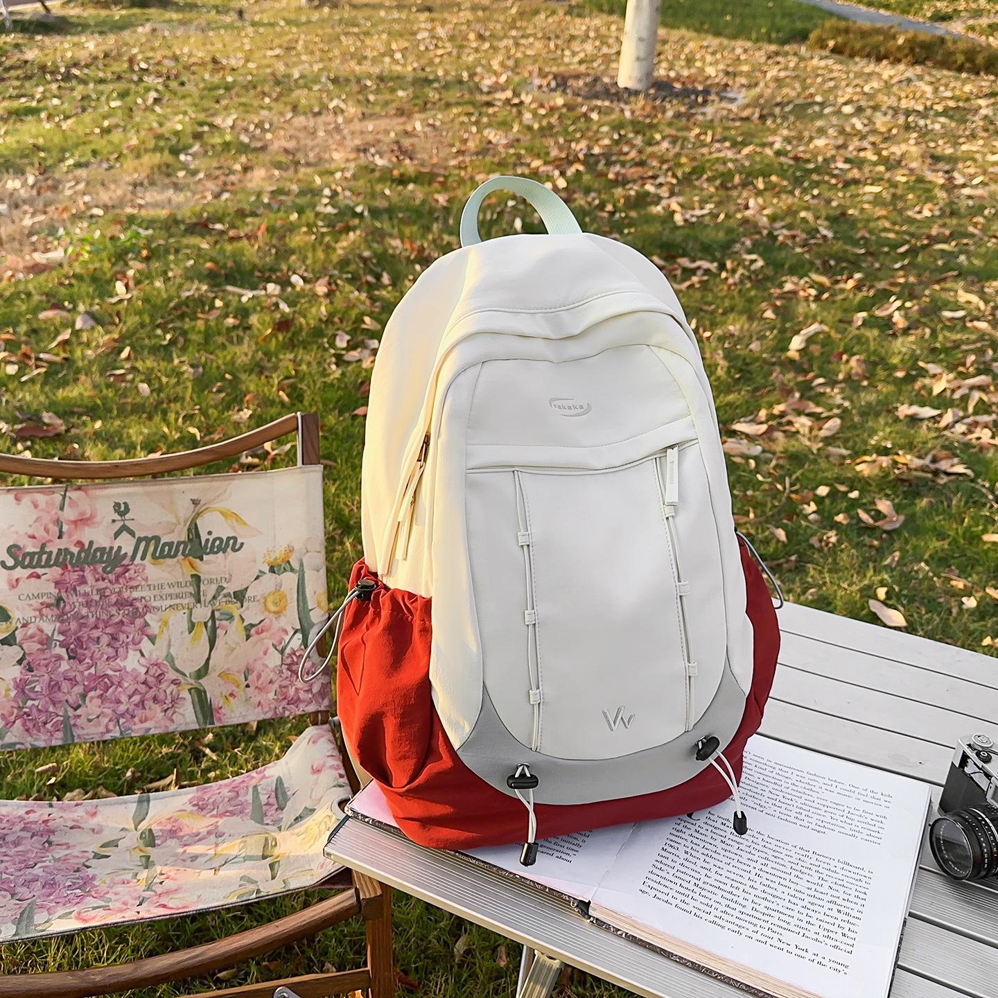 Outdoor large-capacity color-blocked hiking backpack, lightweight autumn outing bag, stylish student commuter school bag